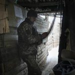 
              A Ukrainian serviceman prepares ammunitions in a shelter on the front line in the Luhansk region, eastern Ukraine, Friday, Jan. 28, 2022. High-stakes diplomacy continued on Friday in a bid to avert a war in Eastern Europe. The urgent efforts come as 100,000 Russian troops are massed near Ukraine's border and the Biden administration worries that Russian President Vladimir Putin will mount some sort of invasion within weeks. (AP Photo/Vadim Ghirda)
            