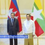 
              In this image made from video broadcast by Myanmar state broadcaster MRTV, Cambodian Prime Minister Hun Sen and Myanmar State Administration Council Chairman, Senior General Min Aung Hlaing stand together before holding a meeting in Naypyitaw, Myanmar, Friday Jan. 7, 2022. Cambodian Prime Minister Hun Sen’s visit to Myanmar seeking to revive peace efforts after last year's military takeover has provoked an angry backlash among critics, who say he is legitimizing the army’s seizure of power. (MRTV via AP)
            