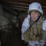 
              Hennadiy, an Ukrainian serviceman, prepares to exit a bunker on the front line in the Luhansk area, eastern Ukraine, Thursday, Jan. 27, 2022. The U.S. rejection of Russia's main demands to resolve the crisis over Ukraine left "little ground for optimism," the Kremlin said Thursday, but added that dialogue was still possible. (AP Photo/Vadim Ghirda)
            
