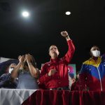 
              Former Foreign Minister Jorge Arreaza, of the ruling socialist party, gives a press conference to concede the previous day's gubernatorial re-run election to opposition candidate Sergio Garrido in Barinas, Venezuela, Monday Jan. 10, 2022. (AP Photo/Matias Delacroix)
            