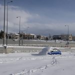
              An abandoned vehicle, is seen in an motorway way after a snowstorm, in Athens, on Tuesday, Jan. 25, 2022. Army and fire service teams were deployed late Monday to extract hundreds of motorists trapped for hours in snowed-in cars. A snowstorm of rare severity disrupted road and air traffic Monday in the Greek capital of Athens and neighboring Turkey's largest city of Istanbul, while most of Greece, including — unusually — several Aegean islands, and much of Turkey were blanketed by snow. (AP Photo/Michael Varaklas)
            