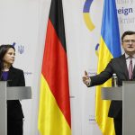 
              German Foreign Minister Annalena Baerbock, left, and Ukrainian Foreign Minister Dmytro Kuleba attend a joint news conference following their talks in Kyiv, Ukraine, Monday, Feb. 7, 2022. (Gleb Garanich/Pool Photo via AP)
            