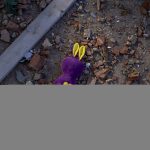 
              A toy amongst the debris near an apartment building damaged following a rocket attack, in Kyiv, Ukraine, Saturday, Feb. 26, 2022. Russian troops stormed toward Ukraine's capital Saturday, and street fighting broke out as city officials urged residents to take shelter. (AP Photo/Emilio Morenatti)
            