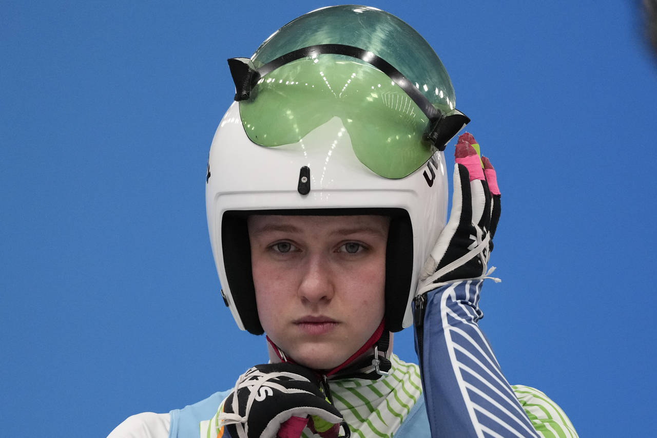 Elsa Desmond, of Ireland, prepares to start for the luge women's singles run 1 at the 2022 Winter O...
