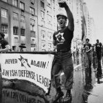 
              FILE - Members of the Jewish Defense League march in New York on Sunday, May 23, 1982 during a salute to Israel parade. (AP Photo/Elias, File)
            