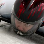 
              FILE - Kim Meylemans, of Belgium, starts during the women's skeleton race at the Bobsleigh and Skeleton World Championships in Altenberg, Germany, Feb. 11, 2021. Meylemans was permitted to enter one of the Olympic villages early Thursday, Feb. 3, 2022, a move that came hours after she tearfully turned to social media and detailed how upset she was about being in isolation over virus concerns. Meylemans tested positive for COVID-19 upon her arrival at the Beijing Olympics, which meant she had to enter isolation and return several negative tests before being cleared to move into the Yanqing Olympic Village. (AP Photo/Matthias Schrader, File)
            