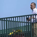 
              St. Louis Cardinals President of Baseball Operations John Mozeliak stands on a balcony as negotiations continue between Major League Baseball and the players association in an attempt to reach an agreement to salvage March 31 openers and a 162-game season, Monday, Feb. 28, 2022, at Roger Dean Stadium in Jupiter, Fla. (AP Photo/Lynne Sladky)
            