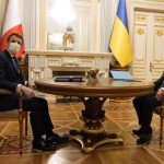 
              Ukrainian President Volodymyr Zelenskyy, right, meets French President Emmanuel Macron, Tuesday, Feb. 8, 2022 in Kyiv, Ukraine. Diplomatic efforts to defuse the tensions around Ukraine continued on Tuesday with French President Emmanuel Macron in Kyiv the day after hours of talks with the Russian leader in Moscow yielded no apparent breakthroughs. (AP Photo/Thibault Camus, Pool)
            