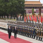 
              FILE - Russian President Vladimir Putin, right, reviews a military honour guard with Chinese President Xi Jinping during a welcome ceremony outside the Great Hall of the People in Beijing, June 8, 2018. Amid the soaring tensions over Ukraine, President Vladimir Putin is heading to Beijing on a trip intended to help strengthen Russia's ties with China and coordinate their policies amid Western pressure. (Greg Baker/Pool via AP, File)
            