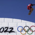 
              FILE - Canada's Darcy Sharpe competes during the men's slopestyle qualifying at the 2022 Winter Olympics, Feb. 6, 2022, in Zhangjiakou, China. Beijing’s air still has a long way to go, but is measurably better than past years. (AP Photo/Gregory Bull, File)
            