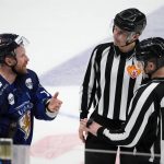 
              FILE - Finland's Leo Komarov speaks with referees during the Channel One Cup ice hockey match between Russia and Finland in Moscow, Russia, Sunday, Dec. 19, 2021. Leo Komarov is expected to play for Finland at the Olympics after the NHL decided not to send players to Beijing. Komarov played in the NHL as recently as October, and he and the New York Islanders agreed to mutually terminate his contract in November.(AP Photo/Alexander Zemlianichenko, File)
            