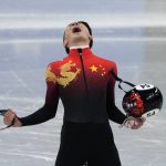 
              Ren Ziwei of China, celebrates after winning the men's 1,000-meter final during the short track speedskating competition at the 2022 Winter Olympics, Monday, Feb. 7, 2022, in Beijing. (AP Photo/Natacha Pisarenko)
            