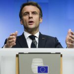 
              French President Emmanuel Macron speaks during a media conference after an extraordinary EU summit on Ukraine in Brussels, Friday, Feb. 25, 2022. European Union leaders put on a united front after a six-hour meeting during which they agreed on a second package of economic and financial sanctions against Russia. (Olivier Hoslet, Pool Photo via AP)
            