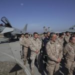 
              A Eurofighter EF-2000 Typhoon II jet is seen as Spanish air force personnel and air crafts are deployed in Bulgaria for air-policing mission, in Graf Ignatievo, Thursday, Feb. 17, 2022.. As part of the united efforts of NATO partners to bolster the defense of the Alliance's eastern flank while tensions are continuing over a possible Russian invasion in Ukraine, Spain is sending fighter jets to Bulgaria to implement joint air policing missions. (AP Photo/Valentina Petrova)
            