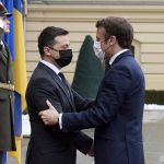 
              In this handout photo provided by the Ukrainian Presidential Press Office, Ukrainian President Volodymyr Zelenskyy, left, and French President Emmanuel Macron greet each other prior to their talks in Kyiv, Ukraine, Tuesday, Feb. 8, 2022. Diplomatic efforts to defuse the tensions around Ukraine continued on Tuesday with French President Emmanuel Macron arriving in Kyiv the day after hours of talks with the Russian leader in Moscow yielded no apparent breakthroughs.  (Ukrainian Presidential Press Office via AP)
            