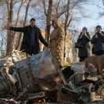 
              People stand next to fragments of military equipment on the street in the aftermath of an apparent Russian strike in Kharkiv in Kharkiv, Ukraine, Thursday, Feb. 24, 2022. Russian troops have launched their anticipated attack on Ukraine. Big explosions were heard before dawn in Kyiv, Kharkiv and Odesa as world leaders decried the start of an Russian invasion that could cause massive casualties and topple Ukraine's democratically elected government. (AP Photo/Andrew Marienko )
            