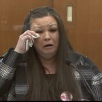 In this screen grab from video, Katie Wright, mother of Daunte Wright, wipes away a tear as she speaks during the sentencing hearing of former Brooklyn Center Police Officer Kim Potter Feb. 18, 2022 at the Hennepin County Courthouse in Minneapolis. Potter, who said she confused her Taser and her handgun before shooting Wright during a traffic stop, was convicted of first- and second-degree manslaughter in Wright. (Court TV via AP, Pool, File)