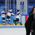 
              United States' Brianna Decker (14) leaves the the ice after losing to Canada in the women's gold medal hockey game at the 2022 Winter Olympics, Thursday, Feb. 17, 2022, in Beijing. (AP Photo/Petr David Josek)
            