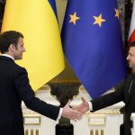 
              Ukrainian President Volodymyr Zelenskyy, right, and French President Emmanuel Macron go to shake hands after a joint news conference following their talks in Kyiv, Ukraine, Tuesday, Feb. 8, 2022. Diplomatic efforts to defuse the tensions around Ukraine continued on Tuesday with French President Emmanuel Macron arriving in Kyiv the day after hours of talks with the Russian leader in Moscow yielded no apparent breakthroughs. (AP Photo/Efrem Lukatsky)
            