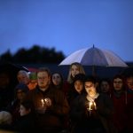 
              FILE - People hold candles as they gather for a vigil in the aftermath of a deadly shooting at the Tree of Life Congregation, in the Squirrel Hill neighborhood of Pittsburgh, Saturday, Oct. 27, 2018. Greg Schneider, executive vice president the Conference on Jewish Material Claims Against Germany, also referred to as the Claims Conference, says the key to combatting antisemitism is education about the Holocaust. And he hopes the Whoopi Goldberg controversy also reminds people that Jews have been -- and continue to be -- discriminated in America. (AP Photo/Matt Rourke, File)
            