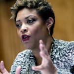 
              FILE - Shalanda Young, President Biden's nominee for Director of the Office of Management and Budget (OMB), speaks during a Senate Homeland Security and Governmental Affairs Committee confirmation hearing, Feb. 1, 2022 in Washington.  Young is awaiting a vote by the Senate to confirm her as director. She would be the first Black woman to lead the office if confirmed, which is expected. Six Black members of President Joe Biden's Cabinet will be meeting for a Black History Month event Thursday highlighting their roles in the administration, some of which are historic firsts.  (Al Drago/Bloomberg via AP, File)
            