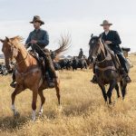 
              This image released by Netflix shows Benedict Cumberbatch, left, and Jesse Plemons in a scene from "The Power of the Dog." (Kirsty Griffin/Netflix via AP)
            