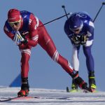 
              Russian athlete Alexander Bolshunov competes during the men's 15km + 15km skiathlon cross-country skiing competition at the 2022 Winter Olympics, Sunday, Feb. 6, 2022, in Zhangjiakou, China. (AP Photo/Alessandra Tarantino)
            