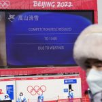 
              The board shows a delay due to weather for the start of the men's downhill at the 2022 Winter Olympics, Sunday, Feb. 6, 2022, in the Yanqing district of Beijing. (AP Photo/Luca Bruno)
            