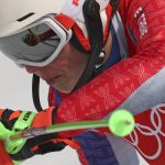 
              Petra Vlhova, of Slovakia passes a gate during the second run of the women's slalom at the 2022 Winter Olympics, Wednesday, Feb. 9, 2022, in the Yanqing district of Beijing. (AP Photo/Alessandro Trovati)
            