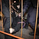 
              Police detain a demonstrator during an action against Russia's attack on Ukraine in St. Petersburg, Russia, Saturday, Feb. 26, 2022. Protests against the Russian invasion of Ukraine resumed on Saturday evening, with people taking to the streets of Moscow and St. Petersburg for the third straight day despite mass arrests. OVD-Info rights group reported that at least 325 people were detained in 26 Russian cities on Saturday in antiwar protests, nearly half of them in Moscow.(AP Photo/Dmitri Lovetsky)
            