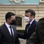 
              French President Emmanuel Macron, right, is welcomed by Ukrainian President Volodymyr Zelenskyy before their talks Tuesday, Feb. 8, 2022 in Kyiv, Ukraine. Diplomatic efforts to defuse the tensions around Ukraine continued on Tuesday with French President Emmanuel Macron in Kyiv the day after hours of talks with the Russian leader in Moscow yielded no apparent breakthroughs. (AP Photo/Thibault Camus, Pool)
            