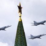 
              FILE - In this May 5, 2016 file photo, Russian Tu-22M3 bombers fly over the Kremlin's Tower with a Red Star on the top. Russia is planning massive drills of its strategic military forces that provide a stark reminder of the country's nuclear might. The Russian Defense Ministry announced the war games on Friday amid Western fears that Moscow might be preparing to invade Ukraine. (AP Photo/Ivan Sekretarev, File)
            