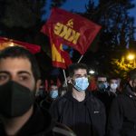 
              Supporters of the Greek Communist party stage a protest against the Russian invasion of Ukraine, in front of the Russian embassy in Athens, on Friday, Feb. 25, 2022. Russian troops bore down on Ukraine's capital Friday, with gunfire and explosions resonating ever closer to the government quarter, in an invasion of a democratic country that has fueled fears of wider war in Europe and triggered worldwide efforts to make Russia stop. (AP Photo/Yorgos Karahalis)
            