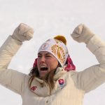 
              Petra Vlhova, of Slovakia celebrates during the medal ceremony after winning the gold medal in the women's slalom at the 2022 Winter Olympics, Wednesday, Feb. 9, 2022, in the Yanqing district of Beijing. (AP Photo/Luca Bruno)
            