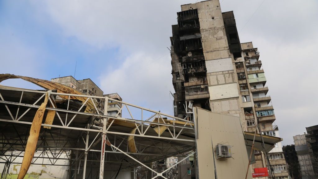 Damaged buildings are seen as evacuation of civilians from secure corridors continues in Mariupol, ...