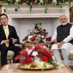 This handout photograph released by India's Ministry of External Affairs shows Indian Prime Minister Narendra Modi and his Japanese counterpart Fumio Kishida  in New Delhi, Saturday, March 19, 2022. 
India says ties with Japan are key to stability in the Indo-Pacific region. The two nations, along with the United States and Australia, are members of the Indo-Pacific alliance known as "the Quad" that is grappling with a rising China's coercive economic practices and military maneuvering. (Ministry of External Affairs via AP)