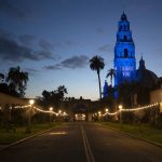 
              FILE - A "Thank You" message and blue floodlights in honor of health care workers and first responders battling the coronavirus are visible on the California Tower and Museum of Man in an empty Balboa Park, Monday, April 13, 2020, in San Diego. (AP Photo/Gregory Bull, File)
            