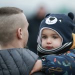 
              Family which fled from the war in Ukraine reunite after crossing the border in Medyka, southeastern Poland, Wednesday, March 2, 2022. The U.N. refugee agency said Tuesday that about 660,000 people have fled Ukraine for neighboring countries since the Russian invasion began. (AP Photo/Visar Kryeziu)
            