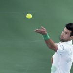 
              Serbia's Novak Djokovic serves to Czech Republic's Jiri Vesely during a match at the Dubai Duty Free Tennis Championship in Dubai, United Arab Emirates, Thursday, Feb. 24, 2022. (AP Photo/Ebrahim Noroozi)
            