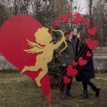 
              Anna Panasyk and Dmytro Shybalov pose by a heart shaped installation outside a marriage office before getting married in Kyiv, Ukraine, Friday, March 4, 2022. A Russian attack at Europe's biggest nuclear power plant in Ukraine did not result in any radiation being released and firefighters extinguished a blaze at the facility, U.N. and Ukrainian officials said, as Russian forces pressed their campaign Friday to cripple the country despite global condemnation. (AP Photo/Vadim Ghirda)
            