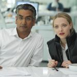 
              This image released by Hulu shows Naveen Andrews as Sunny Balwani, left, and Amanda Seyfried as Elizabeth Holmes in the Hulu series "The Dropout," premiering March 3. (Beth Dubber/Hulu via AP)
            