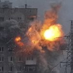 
              An explosion in an apartment building that came under fire from a Russian army tank in Mariupol, Ukraine, Friday, March 11, 2022. Ukraine’s military says Russian forces have captured the eastern outskirts of the besieged city of Mariupol. In a Facebook update Saturday, the military said the capture of Mariupol and Severodonetsk in the east were a priority for Russian forces. Mariupol has been under siege for over a week, with no electricity, gas or water. (AP Photo/Evgeniy Maloletka)
            