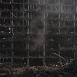 
              Firefighters extinguish a fire at a shopping center following a bombing in Kyiv, Ukraine, Monday, March 21, 2022. (AP Photo/Felipe Dana)
            