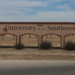 The entrance to University of the Southwest as seen, Wednesday, March 16, 2022, in Hobbs, New Mexico. (AP Photo/Cedar Attanasio)