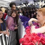 
              Jessica Chastain greets fans as she arrives at the Oscars on Sunday, March 27, 2022, at the Dolby Theatre in Los Angeles. (AP Photo/John Locher)
            