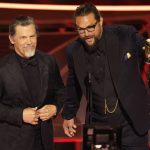 
              Josh Brolin, left, and Jason Momoa present the award for best sound at the Oscars on Sunday, March 27, 2022, at the Dolby Theatre in Los Angeles. (AP Photo/Chris Pizzello)
            