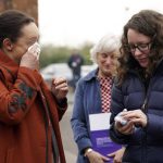 
              Rhiannon Davies, left, and Kayleigh Griffiths, react with emotion following the release of the final report by Donna Ockenden, chair of the Independent Review into Maternity Services at the Shrewsbury and Telford Hospital NHS Trust, at The Mercure Shrewsbury Albrighton Hotel, Shropshire, England, Wednesday, March 30, 2022. A review into a scandal-hit British hospital group said Wednesday that persistent failures in maternity care contributed to the avoidable deaths of more than 200 babies over two decades. The review began in 2018 after two families that had lost their babies in the care of Shrewsbury and Telford NHS Trust in western England campaigned for an inquiry.  (Jacob King/PA via AP)
            