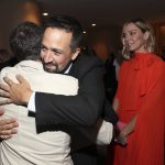 Daniel Durant, left, hugs Lin-Manuel Miranda and Sian Heder, right, attends the 94th Academy Awards nominees luncheon on Monday, March 7, 2022, in Los Angeles. (Photo by Danny Moloshok/Invision/AP)
