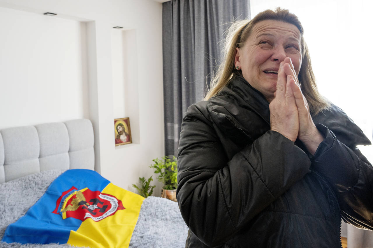 Maria Pavlovych weeps as she remembers her 25-year-old soldier son, Roman Pavlovych, who was killed...