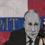 
              A man passes by a mural depicting the Russian President Vladimir Putin, that reads: ''Brother'' in Belgrade, Serbia, Saturday, March 12, 2022. While Serbia has criticized the attack on Ukraine and voted in the United Nations for the condemnation of the attack, Belgrade has refrained from joining Western sanctions against Moscow. Historically considered a friendly nation, Russia remains popular among the Serbs, particularly because of Moscow's support for Serbia's opposition to the Western-backed independence of the breakaway former Kosovo province. (AP Photo/Darko Vojinovic)
            